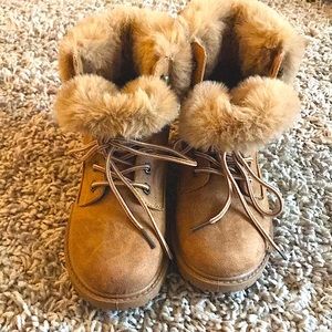 Low cut light brown boots with fur. Never been worn before.